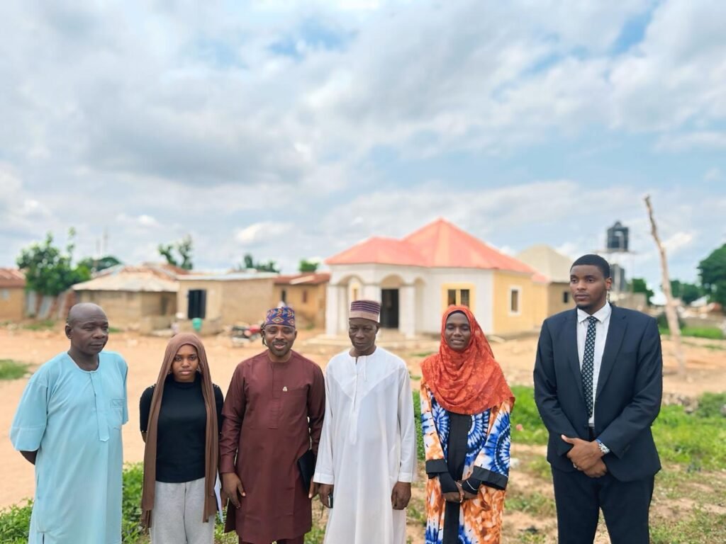 Project team and community representatives during site engagement and land-allocation activities for the Gui Community Energy Project.